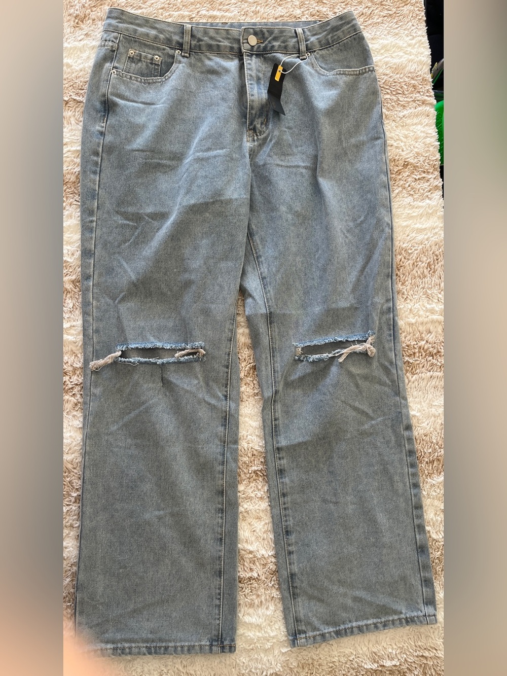 NWT Womanβs Light Blue Distressed Jeans